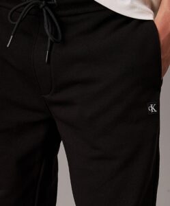 CALVIN KLEIN JEANS – Pantaloni Tuta Uomo con Stemma in Spugna di Cotone Nero